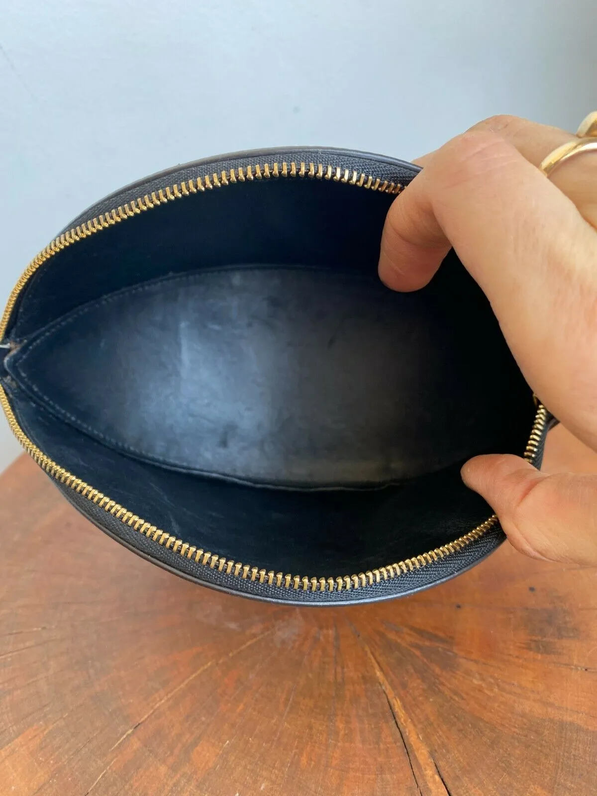 ALMOND WRISTLET CLUTCH