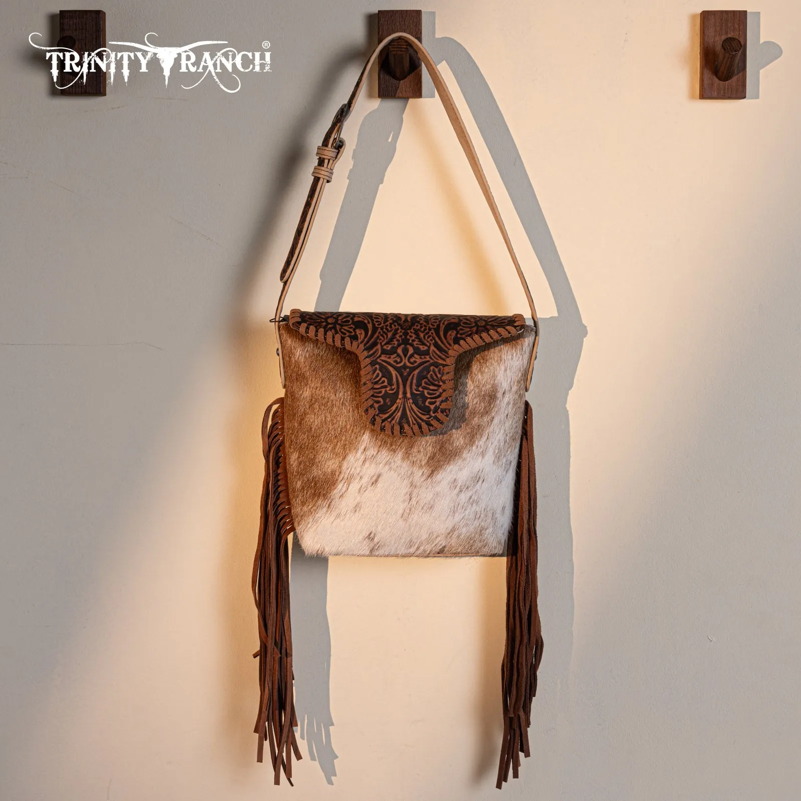 TR182-9181  Trinity Ranch Genuine Hair-On Cowhide Tooled Fringe Shoulder Bag- Tan