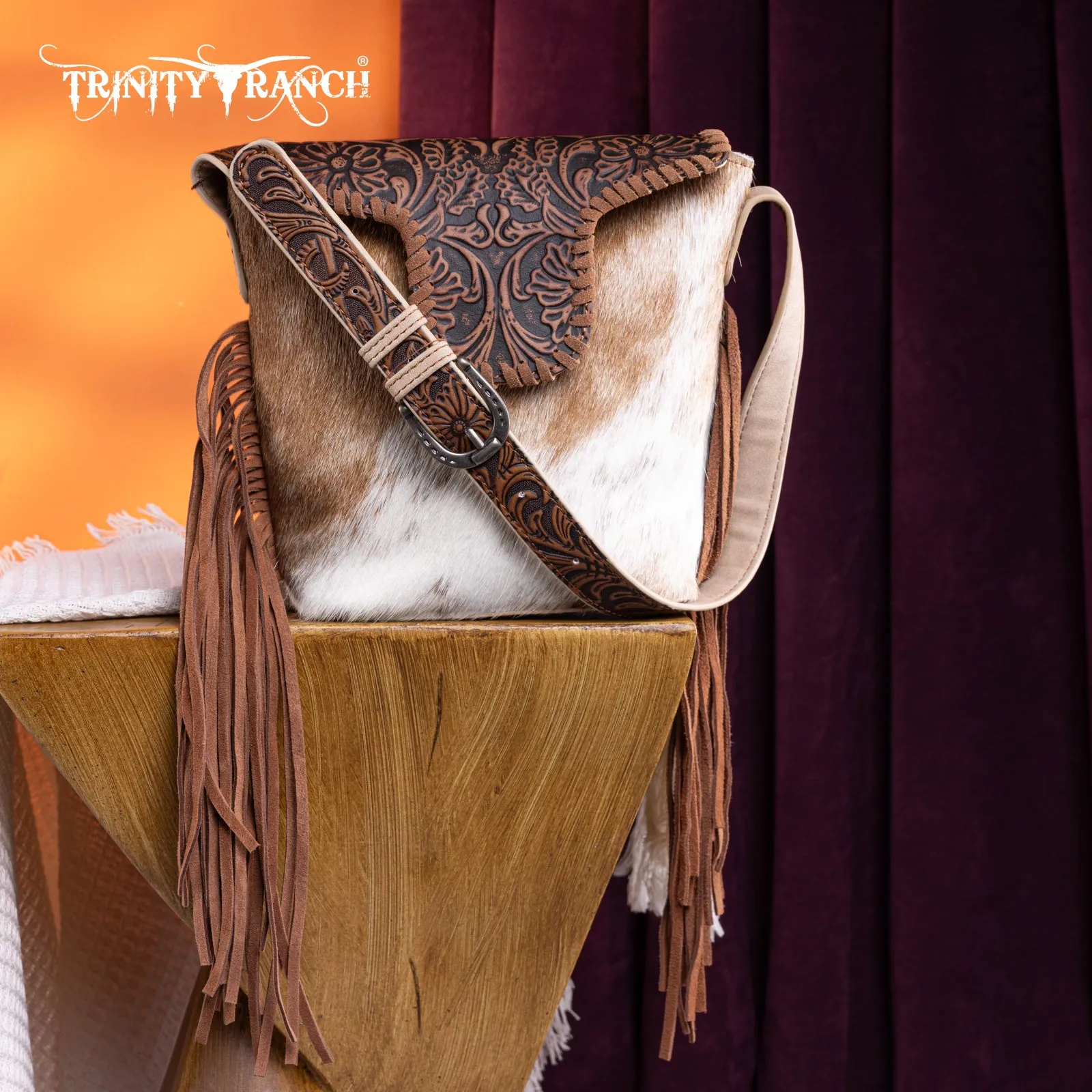 TR182-9181  Trinity Ranch Genuine Hair-On Cowhide Tooled Fringe Shoulder Bag- Tan