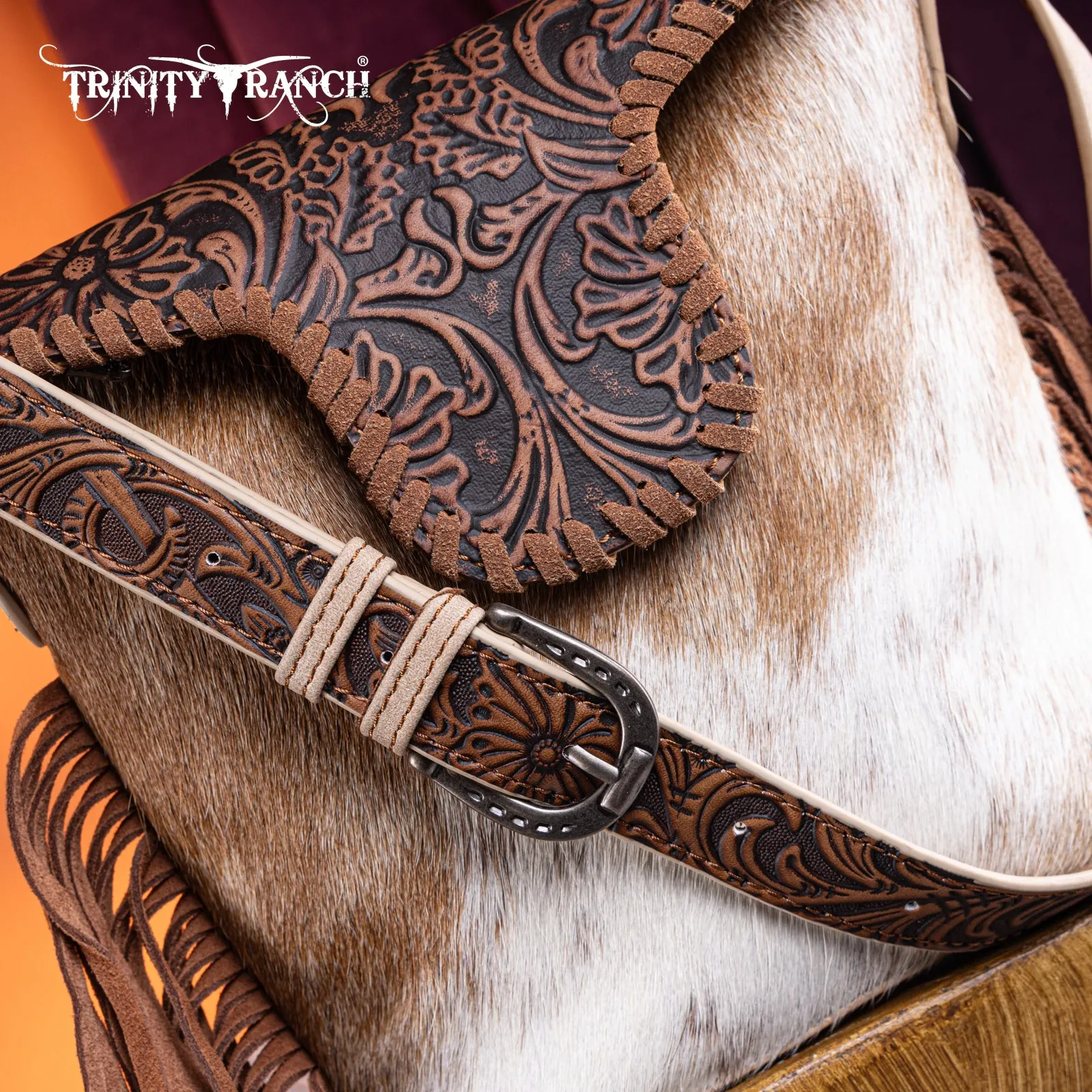 TR182-9181  Trinity Ranch Genuine Hair-On Cowhide Tooled Fringe Shoulder Bag- Tan